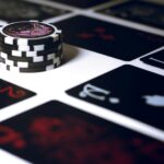 poker chip on white surface